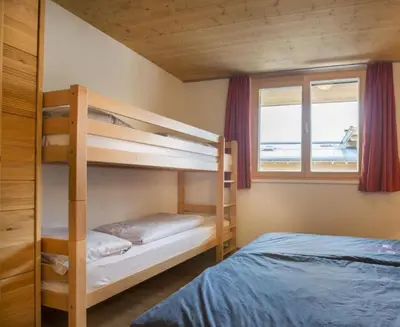 Ein Bett oder Betten in einem Zimmer der Unterkunft Residenz Wildkogelbahnen Top 15