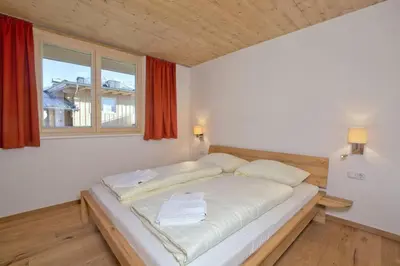 Ein Bett oder Betten in einem Zimmer der Unterkunft Residenz Wildkogelbahnen Top 15