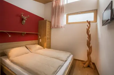 Ein Bett oder Betten in einem Zimmer der Unterkunft Residenz Wildkogelbahnen Top 16