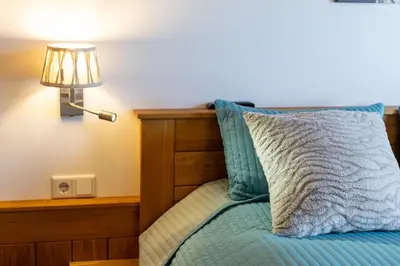 Ein Bett oder Betten in einem Zimmer der Unterkunft Residenz Wildkogelbahnen Top 20