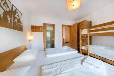Ein Bett oder Betten in einem Zimmer der Unterkunft Residenz Wildkogelbahnen Top 5