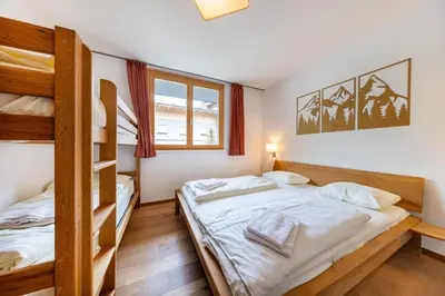 Ein Bett oder Betten in einem Zimmer der Unterkunft Residenz Wildkogelbahnen Top 5