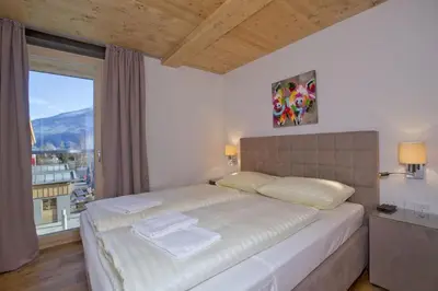 Ein Bett oder Betten in einem Zimmer der Unterkunft Residenz Wildkogelbahnen Top 21