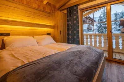 Ein Bett oder Betten in einem Zimmer der Unterkunft Falkensteinalm Top 2