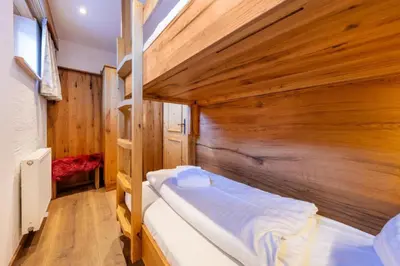 Ein Bett oder Betten in einem Zimmer der Unterkunft Haus Wildkarblick Top 6