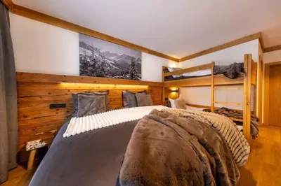 Ein Bett oder Betten in einem Zimmer der Unterkunft Chalet Zillertal Arena 1