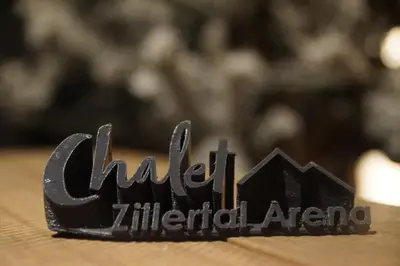 Ein Zertifikat, Auszeichnung, Logo oder anderes Dokument, das in der Unterkunft Chalet Zillertal Arena XL ausgestellt ist