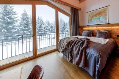 Ein Bett oder Betten in einem Zimmer der Unterkunft Chalet Zillertal Arena 2