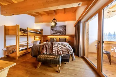 Ein Bett oder Betten in einem Zimmer der Unterkunft Chalet Zillertal Arena 3