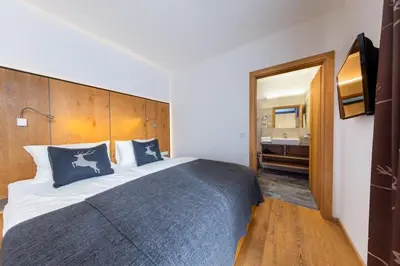 Ein Bett oder Betten in einem Zimmer der Unterkunft Am Sonnenhang Top 4