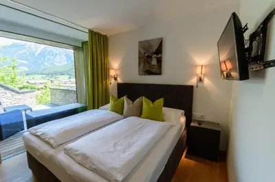 Ein Bett oder Betten in einem Zimmer der Unterkunft Am Sonnenhang Top 8 - Premium SommerCard & Sauna incl