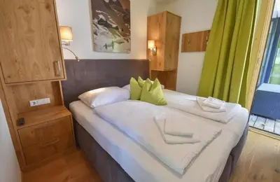 Ein Bett oder Betten in einem Zimmer der Unterkunft Am Sonnenhang Top 8 - Premium SommerCard & Sauna incl