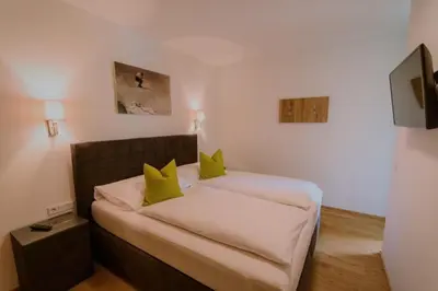 Ein Bett oder Betten in einem Zimmer der Unterkunft Am Sonnenhang Top 8 - Premium SommerCard & Sauna incl