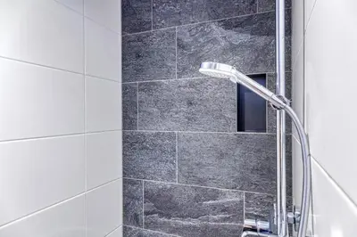 Ein Badezimmer in der Unterkunft Edelweisshaus Top 1