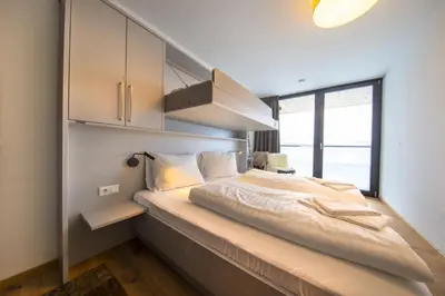 Ein Bett oder Betten in einem Zimmer der Unterkunft Edelweisshaus Top 14