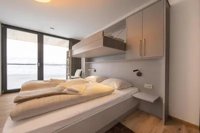 Ein Bett oder Betten in einem Zimmer der Unterkunft Edelweisshaus Top 14