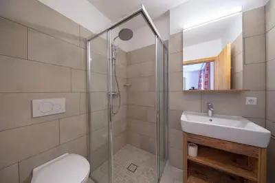 Ein Badezimmer in der Unterkunft Edelweisshaus Top 12
