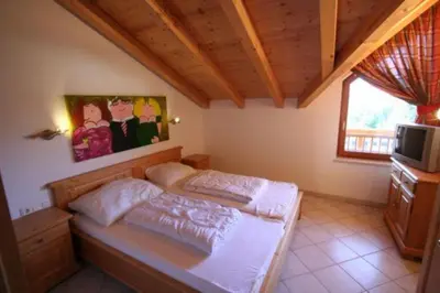 Ein Bett oder Betten in einem Zimmer der Unterkunft Königsblick Top 4