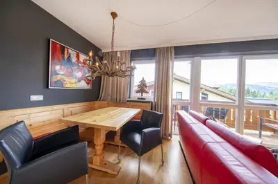 Ein Sitzbereich in der Unterkunft Königsblick Top 6