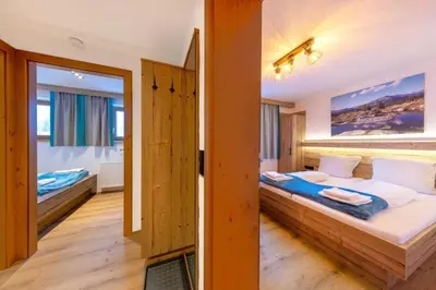 Ein Bett oder Betten in einem Zimmer der Unterkunft Haus Wildkarblick Top 4