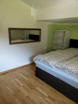 Ein Bett oder Betten in einem Zimmer der Unterkunft Kurort Tirol