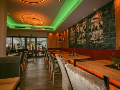Ein Restaurant oder anderes Speiselokal in der Unterkunft Apartment Erzherzog's Apts Kaiser und Alpenlodge by Interhome