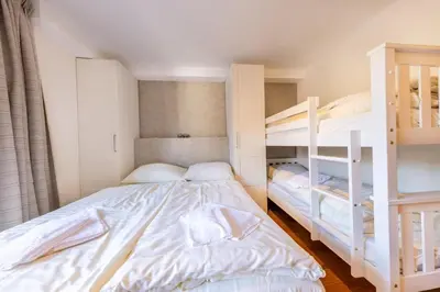 Ein Bett oder Betten in einem Zimmer der Unterkunft Residenz Sonnenfeld Top 5A