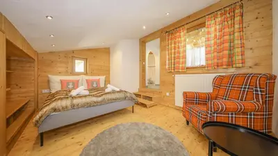 Ein Bett oder Betten in einem Zimmer der Unterkunft Apartment Jochberger Tor by ONE-Villas