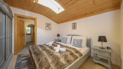 Ein Bett oder Betten in einem Zimmer der Unterkunft Apartment Jochberger Tor by ONE-Villas