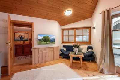 Ein Bett oder Betten in einem Zimmer der Unterkunft Hannes Appartement in im Zentrum von Kirchberg - by NV-Appartements