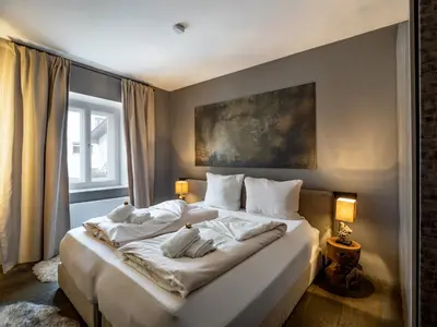 Ein Bett oder Betten in einem Zimmer der Unterkunft Consti modernes Appartement mit 2 Schlafzimmern - by NV-Appartements