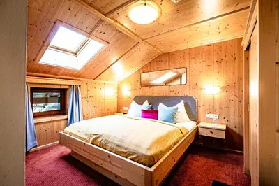 Ein Bett oder Betten in einem Zimmer der Unterkunft Das Dorfgefühl Pension Westendorf