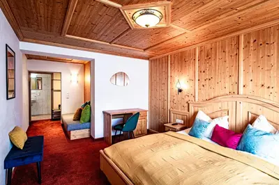 Ein Bett oder Betten in einem Zimmer der Unterkunft Das Dorfgefühl Pension Westendorf
