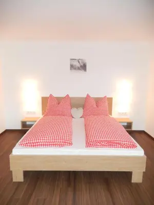 Ein Bett oder Betten in einem Zimmer der Unterkunft ff Appartements