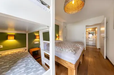 Ein Bett oder Betten in einem Zimmer der Unterkunft Residenz Sonnenfeld Top 1