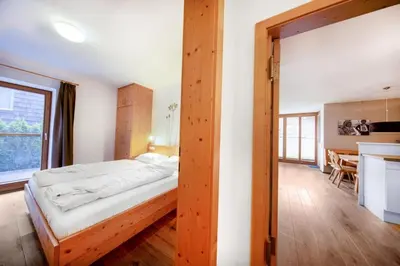Ein Bett oder Betten in einem Zimmer der Unterkunft Residenz Sonnenfeld Top 2