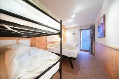 Ein Bett oder Betten in einem Zimmer der Unterkunft Residenz Sonnenfeld Top 4