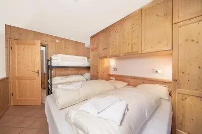 Ein Bett oder Betten in einem Zimmer der Unterkunft Residenz Sonnenfeld Top 4