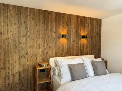 Ein Bett oder Betten in einem Zimmer der Unterkunft Alpenblick