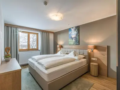 Ein Bett oder Betten in einem Zimmer der Unterkunft Appartements Bergland