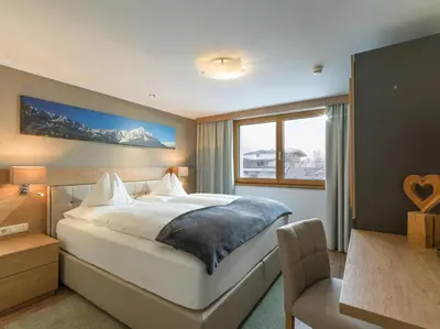 Ein Bett oder Betten in einem Zimmer der Unterkunft Appartements Bergland