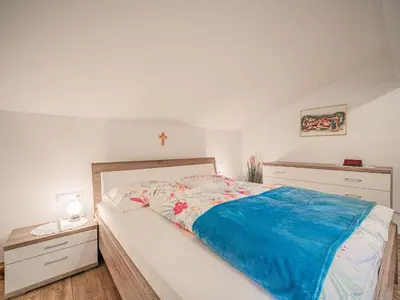 Ein Bett oder Betten in einem Zimmer der Unterkunft Gastl