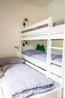 Ein Bett oder Betten in einem Zimmer der Unterkunft Ferienwohnung Haider