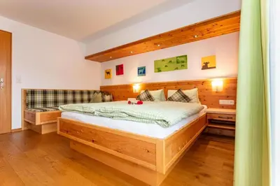 Ein Bett oder Betten in einem Zimmer der Unterkunft Seetalhof