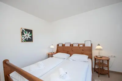 Ein Bett oder Betten in einem Zimmer der Unterkunft Haus Filzstein 145 Top 24