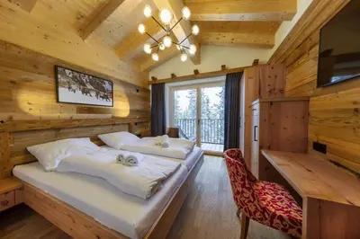 Ein Bett oder Betten in einem Zimmer der Unterkunft Sam Alm