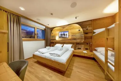 Ein Bett oder Betten in einem Zimmer der Unterkunft Sam Alm Top 1