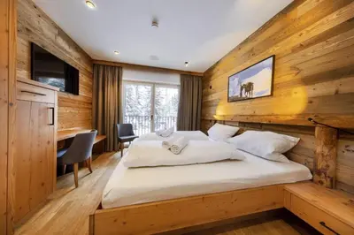 Ein Bett oder Betten in einem Zimmer der Unterkunft Sam Alm Top 1