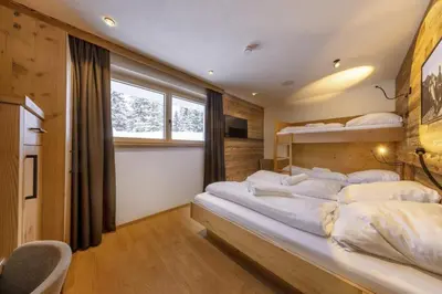 Ein Bett oder Betten in einem Zimmer der Unterkunft Sam Alm Top 2