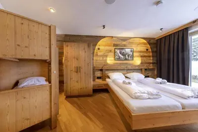 Ein Bett oder Betten in einem Zimmer der Unterkunft Sam Alm Top 2